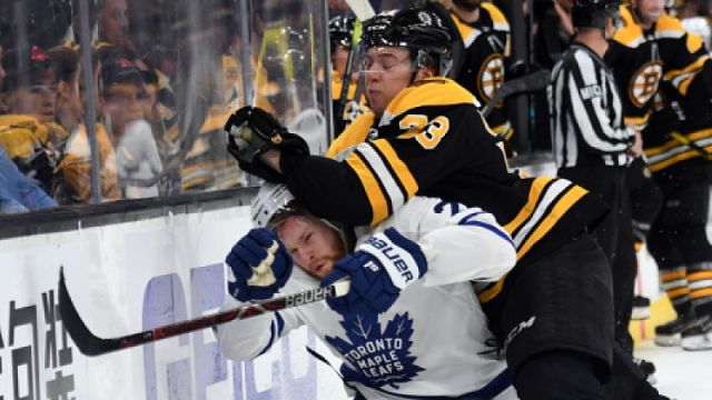 Boston Bruins defenseman Charlie McAvoy, Toronto Maple Leafs' Connor Brown