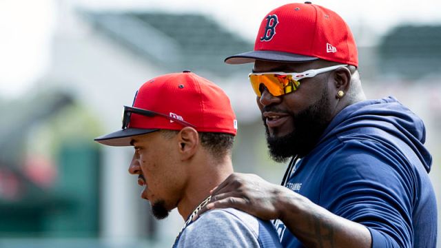 Boston Red Sox outfielder Mookie Betts and former Red Sox player David Ortiz