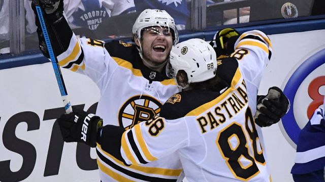 Boston Bruins forwards Jake DeBrusk, David Pastrnak