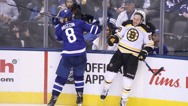 Toronto Maple Leafs defenseman Jake Muzzin and Boston Bruins forward David Pastrnak