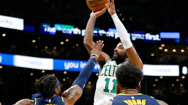 Boston Celtics guard Kyrie Irving (11), Indiana Pacers guard Wesley Matthews esley Matthews (23) and forward Thaddeus Young (21)
