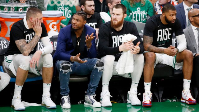 Boston Celtics guard Marcus Smart and teammates