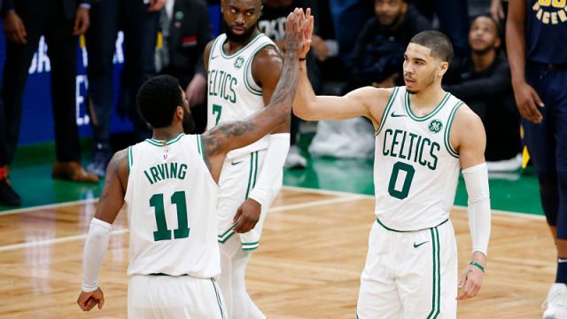 Boston Celtics guard Kyrie Irving and forward Jayson Tatum