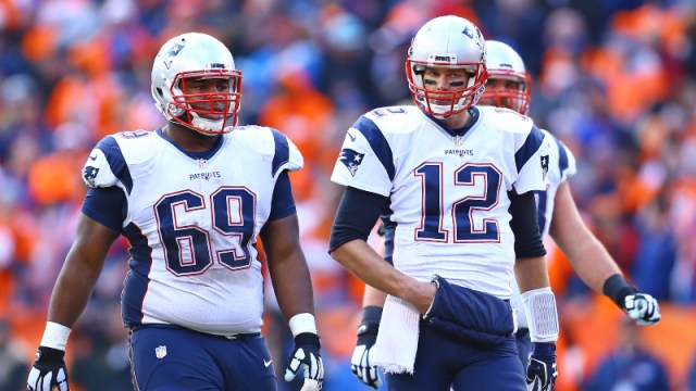 New England Patriots quarterback Tom Brady (12) and offensive lineman Shaq Mason (69)