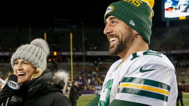 Minneapolis, MN, USA; Green Bay Packers quarterback Aaron Rodgers (12) and Erin Andrews