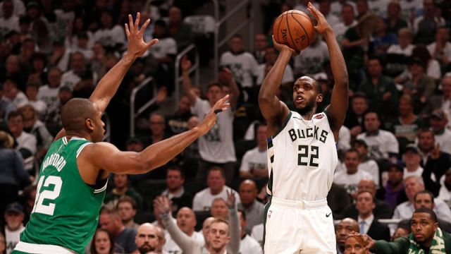 Boston Celtics forward Al Horford and Milwaukee Bucks forward Khris Middleton