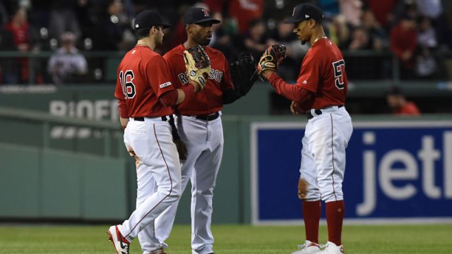 Boston Red Sox outfielders Andrew Benintendi, Jackie Bradley Jr. and Mookie Betts
