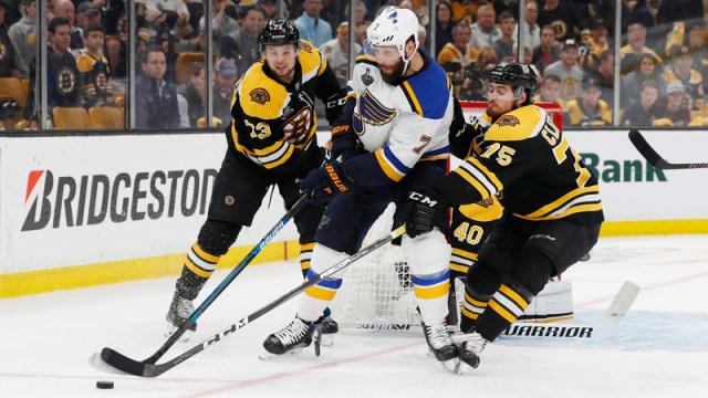 Boston Bruins' Charlie McAvoy And Connor Clifton And St. Louis Blues' Patrick Maroon