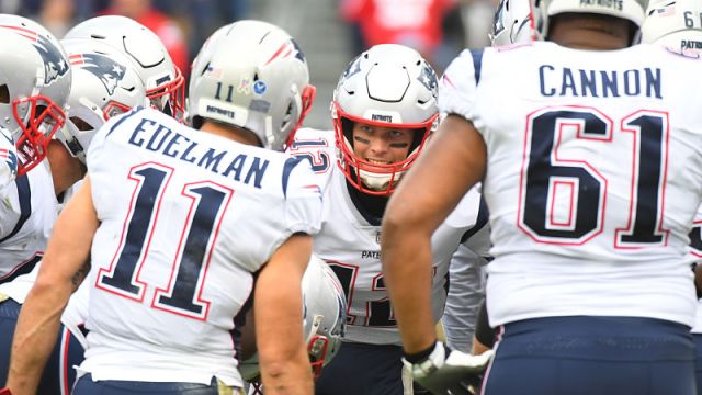 New England Patriots wide receiver Julian Edelman, quarterback Tom Brady and offensive lineman Marcus Cannon
