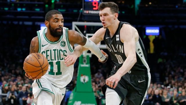 Boston Celtics guard Kyrie Irving and Brooklyn Nets forward Rodions Kurucs