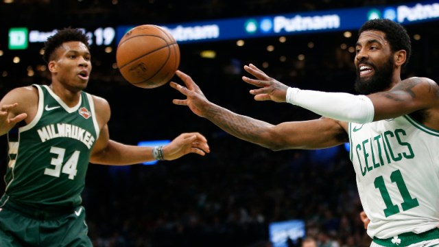 Boston Celtics guard Kyrie Irving (11) and Milwaukee Bucks forward Giannis Antetokounmpo