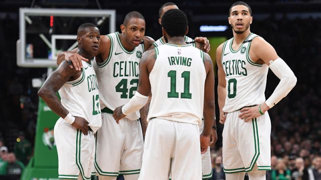 Boston Celtics players Kyrie Irving, Terry Rozier, Al Horford, Jayson Tatum