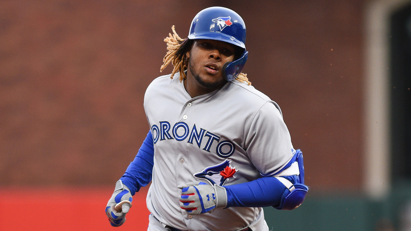 Vlad Guerrero Jr. talks with David Ortiz in Boston