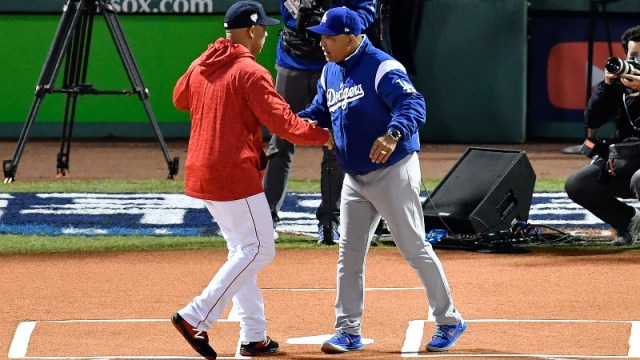 Boston Red Sox manager Alex Cora (left) and Los Angeles Dodgers manager Dave Roberts