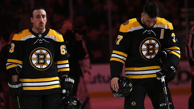 Boston Bruins forwards Brad Marchand and Patrice Bergeron
