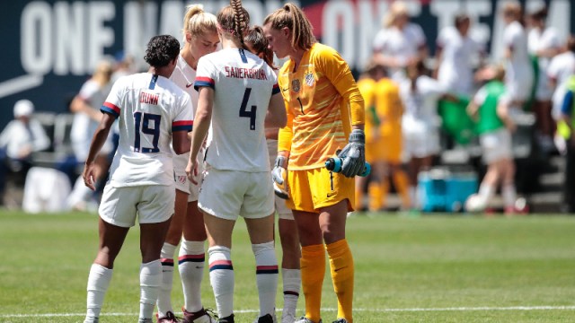 United States forward Crystal Dunn (19) and defender Becky Sauerbrunn (4) and goalkeeper Alyssa Naeher (1)