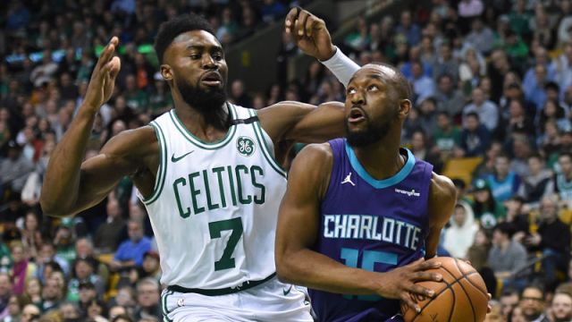 Boston Celtics guard Jaylen Brown and Charlotte Hornets guard Kemba Walker