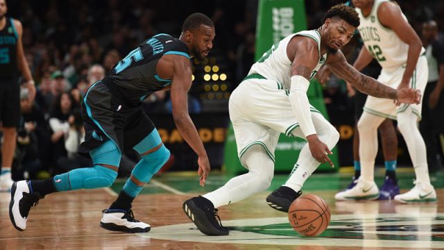 Charlotte Hornets guard Kemba Walker and Boston Celtics guard Marcus Smart