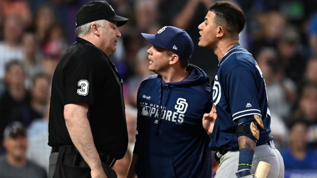 MLB home plate umpire Bill Welke (3) and manager Andy Green (14) and shortstop Manny Machado (13)