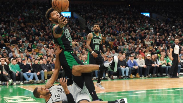 Boston Celtics guard Marcus Smart (36) and San Antonio Spurs forward Rudy Gay (22)