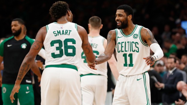 Boston Celtics' Marcus Smart And Kyrie Irving