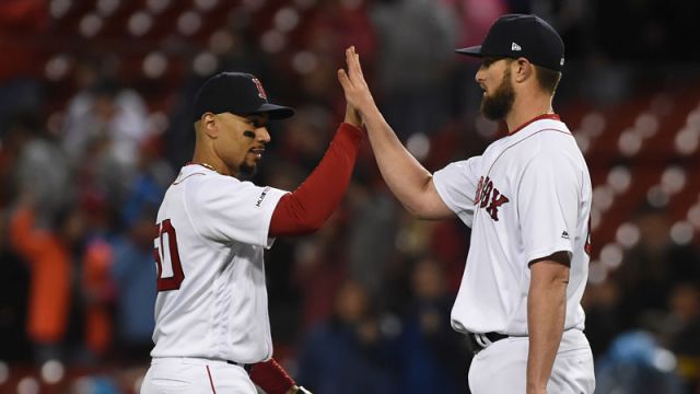 Boston Red Sox right fielder Mookie Betts and relief pitcher Josh Smith