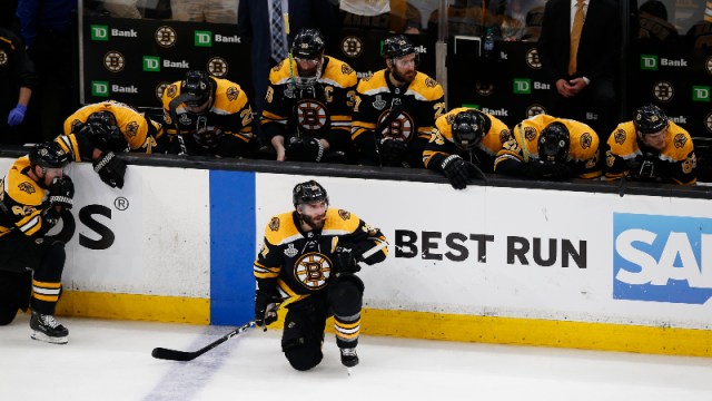 Boston Bruins players including Patrice Bergeron (37)