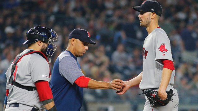 Boston Red Sox manager Alex Cora and pitcher Rick Porcello