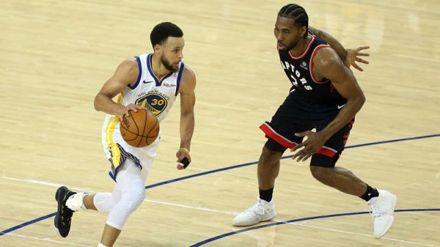 Golden State Warriors guard Stephen Curry and Toronto Raptors forward Kawhi Leonard