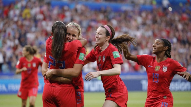 United States forward Christen Press (23), and teammates Lindsey Horan (9) , Rose Lavelle (16) and Crystal Dunn (19)