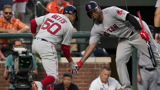 Boston Red Sox outfielder Mookie Betts and third baseman Rafael Devers