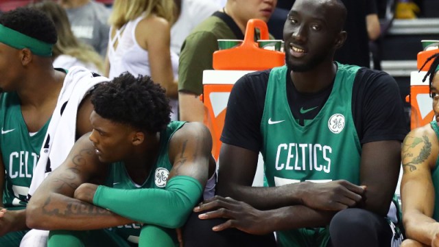 Boston Celtics center Tacko Fall (right) and Robert Williams (left)