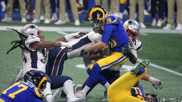 New England Patriots defensive end Adrian Clayborn (94), outside linebacker Dont'a Hightower (54) and middle linebacker Kyle Van Noy (53) and Los Angeles Rams quarterback Jared Goff (16)