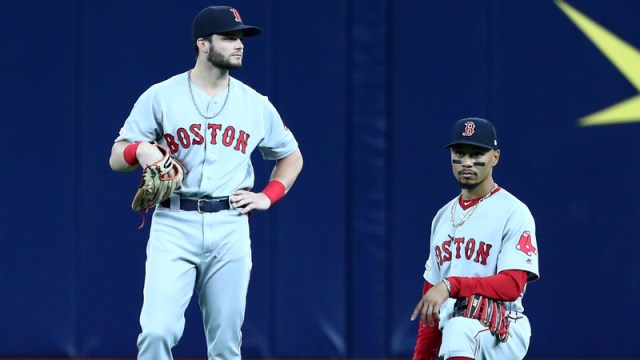 Red Sox outfielders Andrew Benintendi, Mookie Betts