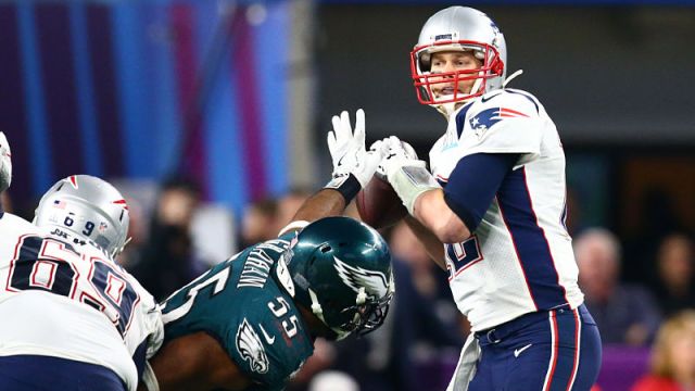 Philadelphia Eagles defensive lineman Brandon Graham and New England Patriots quarterback Tom Brady