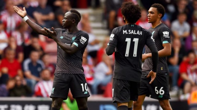 Liverpool forwards Sadio Mane (10), Mohamed Salah (11) and defender Trent Alexander-Arnold (66)