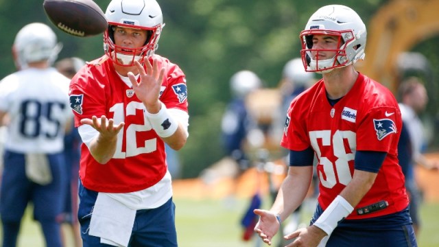 New England Patriots quarterbacks Tom Brady (left) and Jarrett Stidham