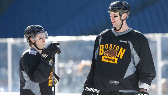 Boston Bruins defensemen Torey Krug and Zdeno Chara