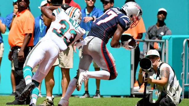 Miami Dolphins cornerback Jomal Wiltz and New England Patriots wide receiver Antonio Brown