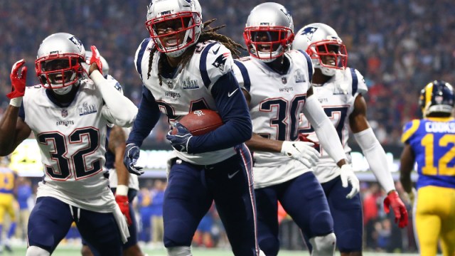 New England Patriots cornerback Stephon Gilmore (24) and teammates