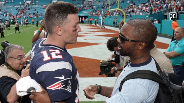 New England Patriots quarterback Tom Brady and former NFL cornerback Charles Woodson