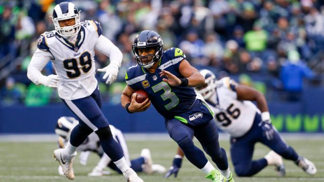 Los Angeles Rams defensive lineman Aaron Donald and Seattle Seahawks quarterback Russell Wilson