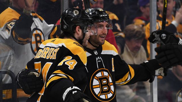 Boston Bruins Jake DeBrusk, Patrice Bergeron