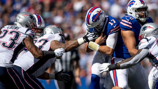 New England Patriots defensive tackle Lawrence Guy and Buffalo Bills quarterback Josh Allen
