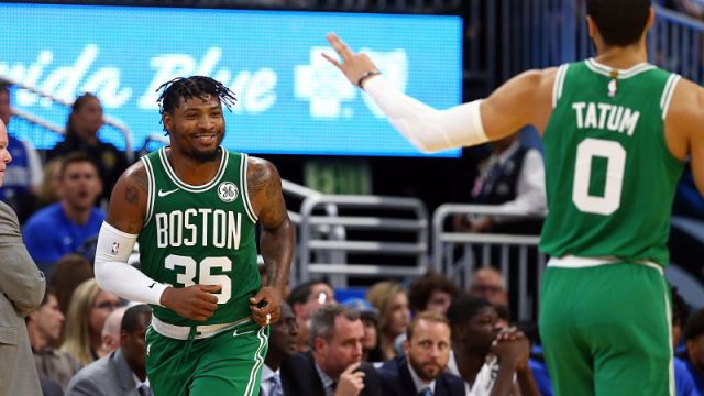 Boston Celtics guard Marcus Smart and Jayson Tatum