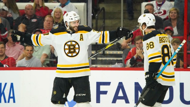 Boston Bruins center Patrice Bergeron (37) and right wing David Pastrnak (88)
