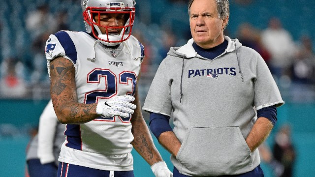 New England Patriots strong safety Patrick Chung (23) and head coach Bill Belichick