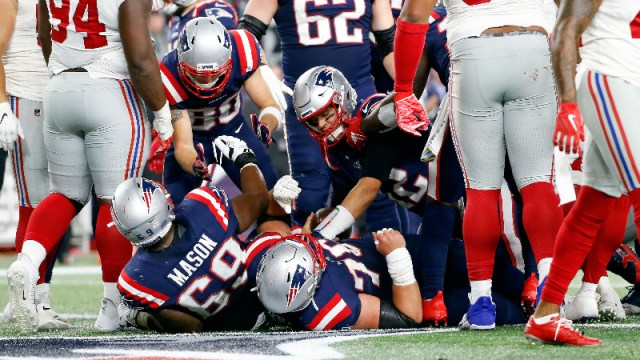 New England Patriots quarterback Tom Brady (12)