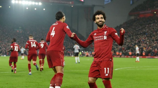 Liverpool defender Virgil van Dijk (4) and Mohamed Salah (11)