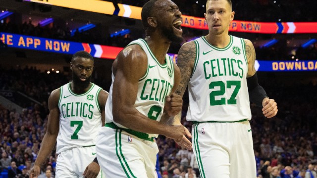 Boston Celtics guard Kemba Walker (8), guard Jaylen Brown (7) and center Daniel Theis (27)